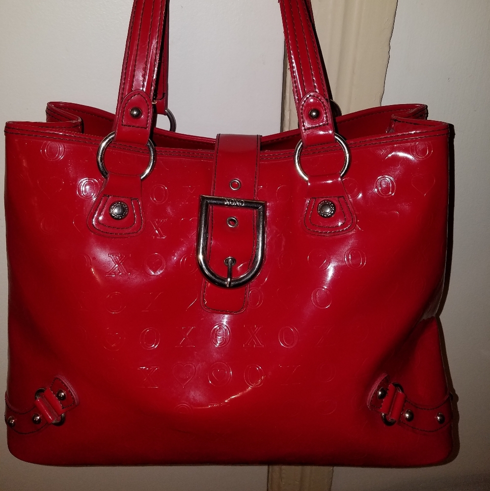 Red patent leather handbag